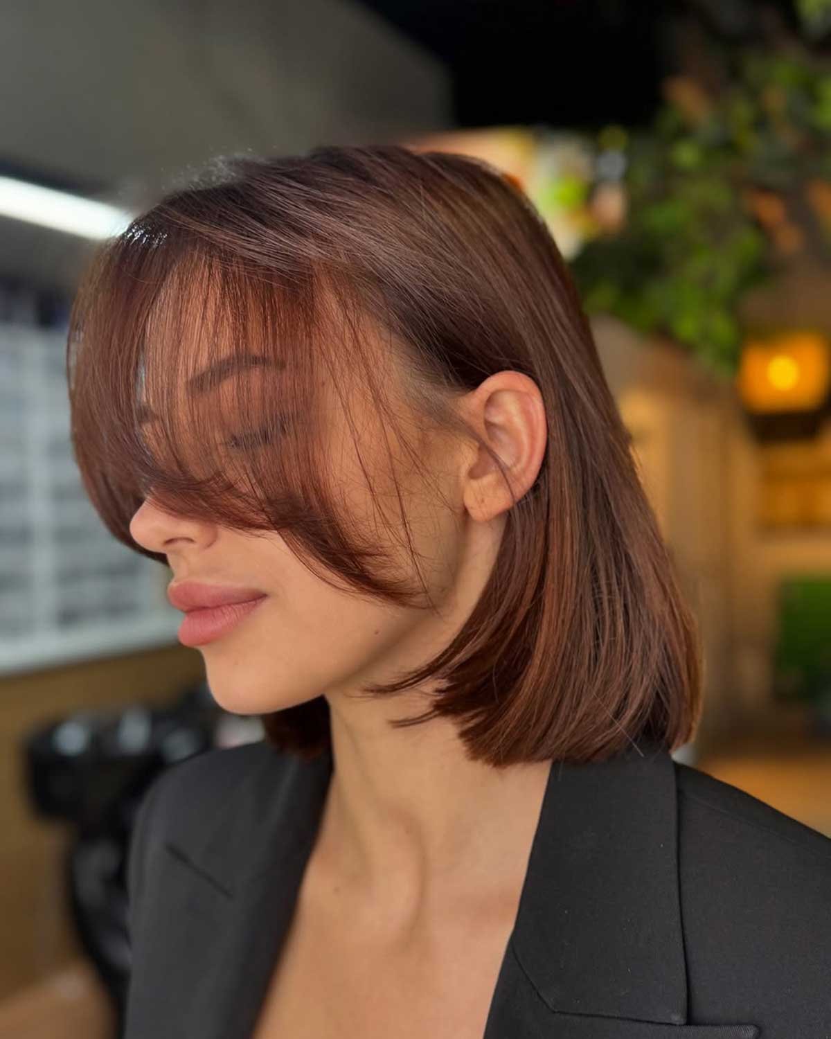 Copper-brown bob haircut with curtain fringe