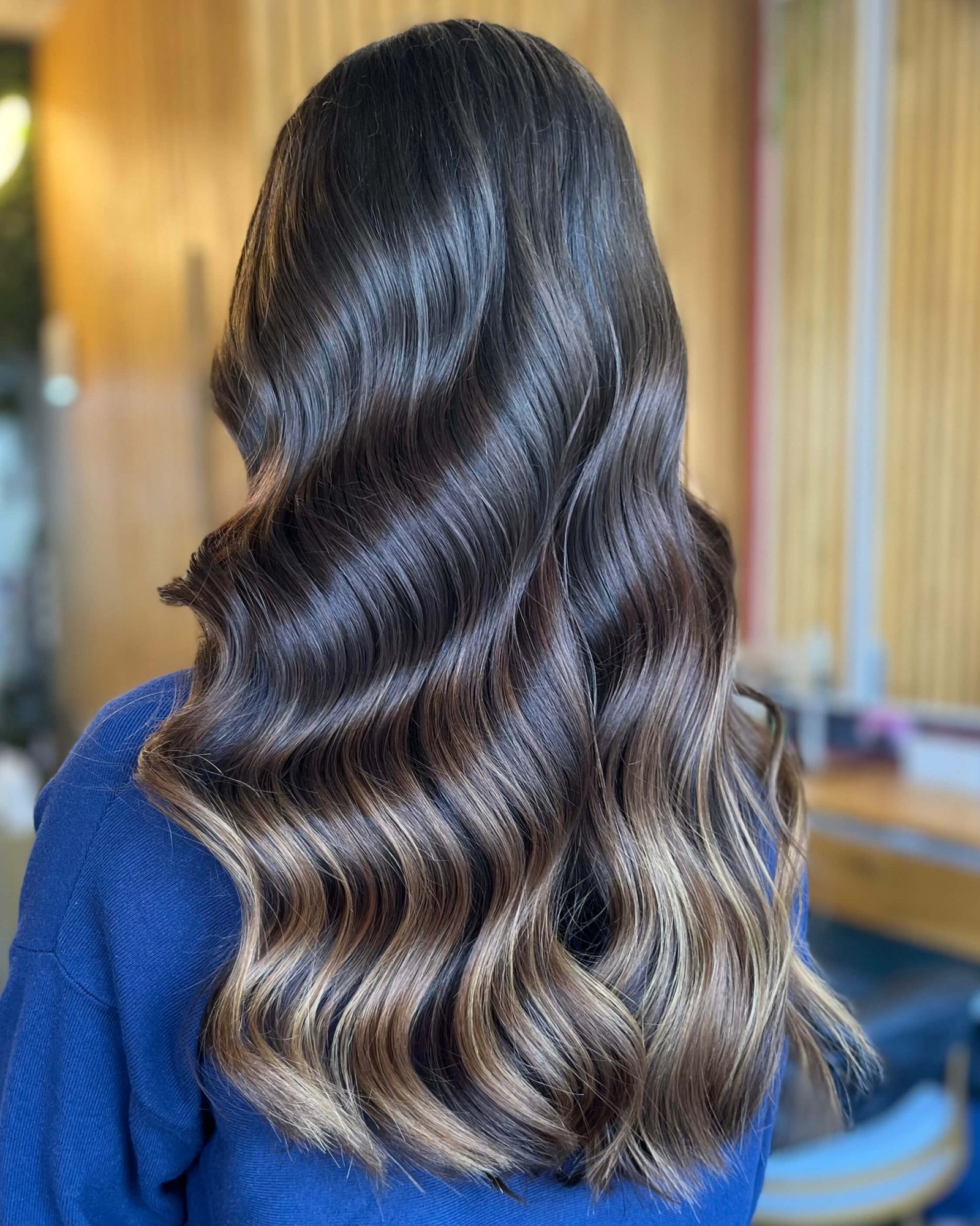 Dark ombré with lighter ends at Ivy Doha