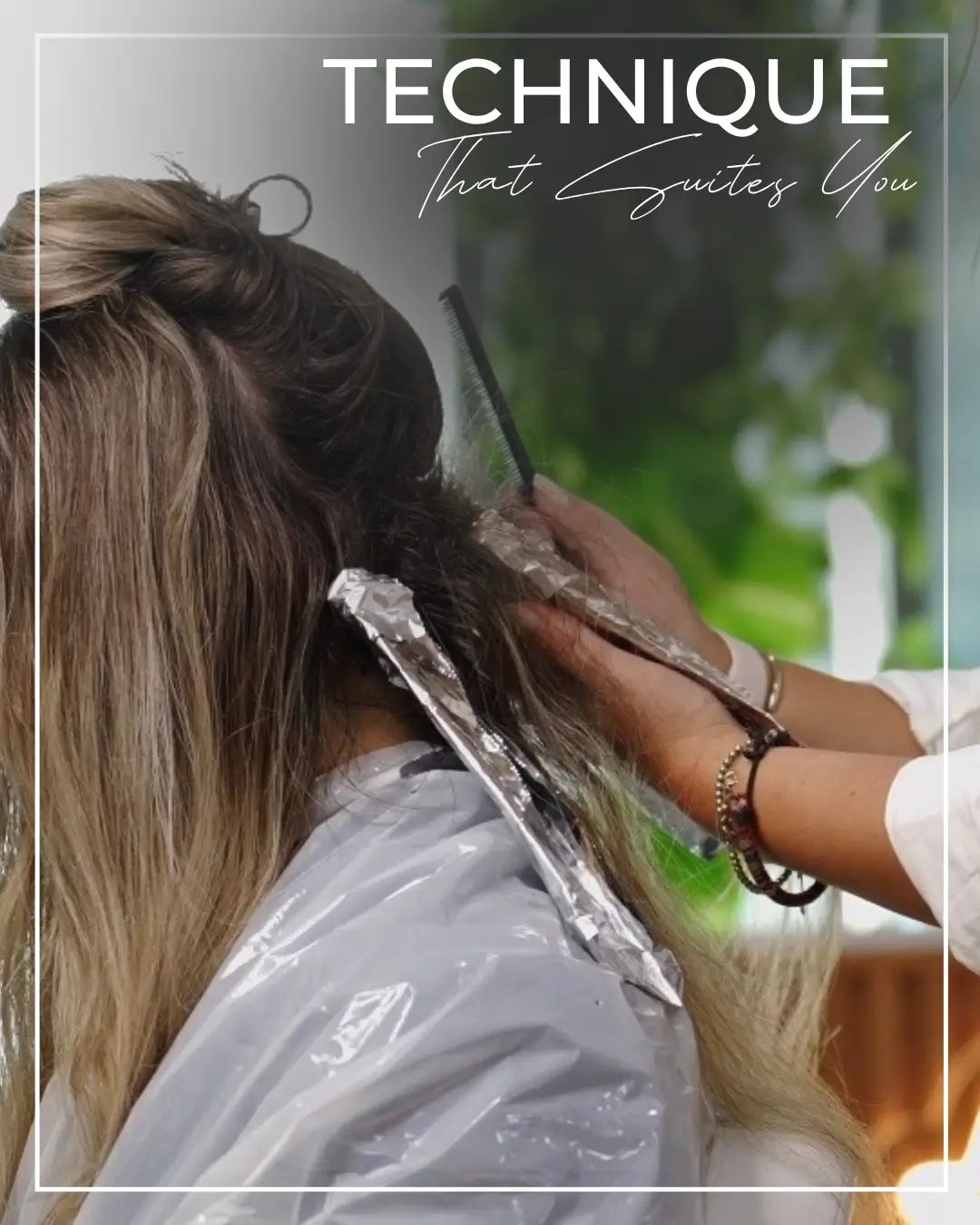 IVY Doha stylist applying hair color with foils to a salon client.